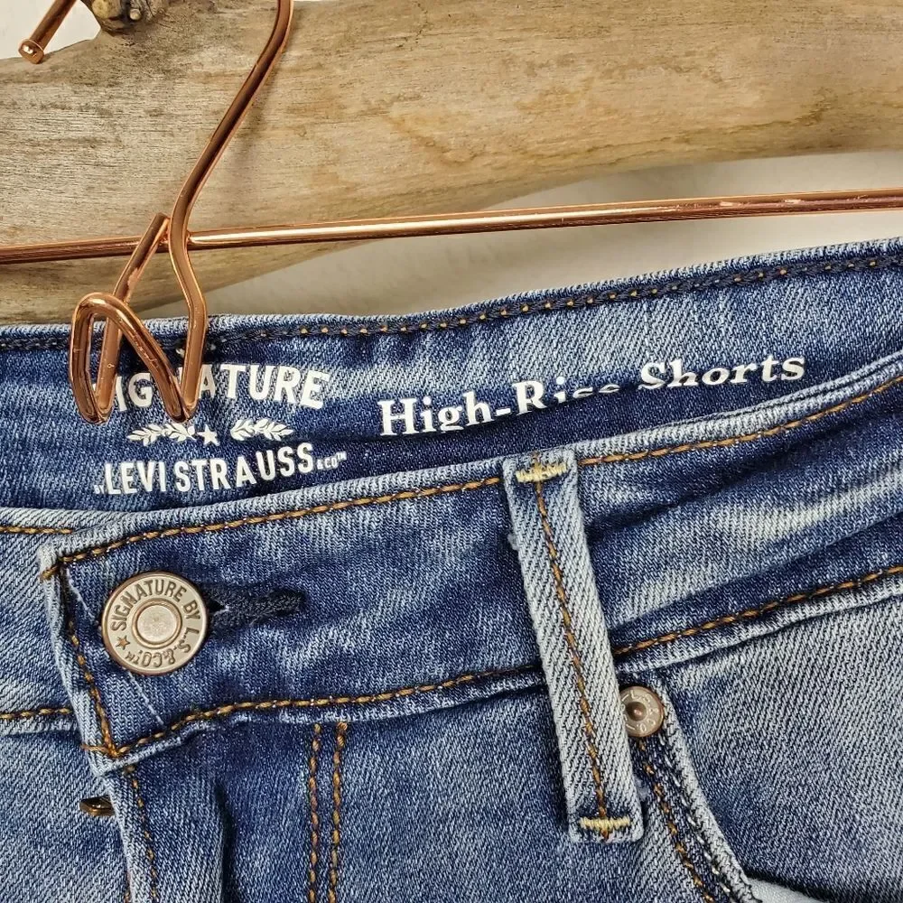 Levi's high rise distressed denim shorts